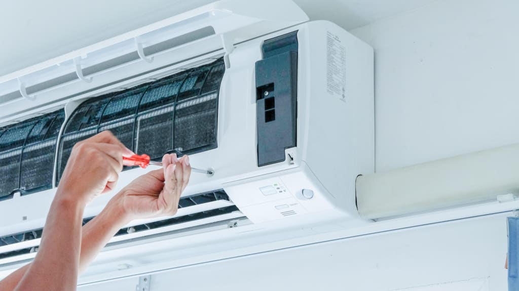 Air conditioner repairing by technician