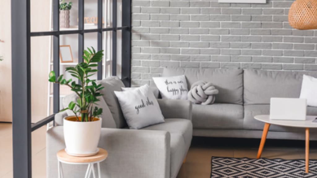 Cozy living room in basement with trendy glass wall devider