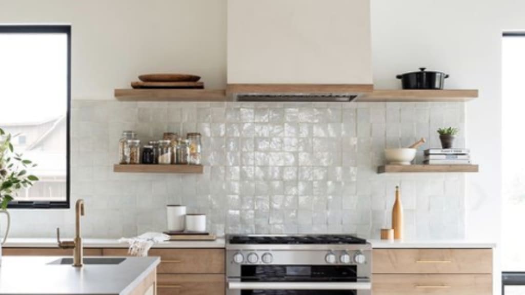 kitchen with wooden cabinets and textured square ceramic backsplash