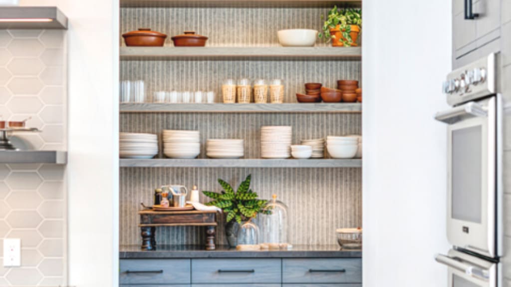 modern kitchen with a lot of storage and shelves