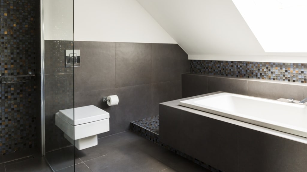 grey contemporary bathroom with a ceramic shower