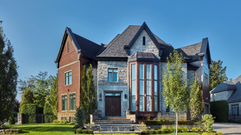 Modern house renovation with dark and light brick and large windows