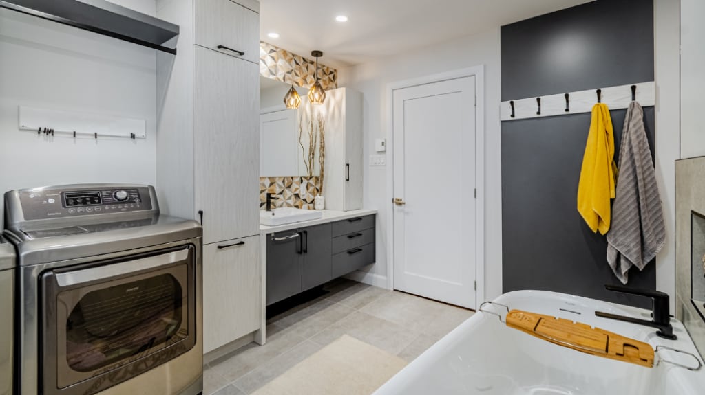 Modern bathroom renovation with accents of yellow
