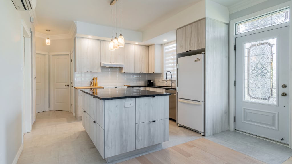 Light toned kitchen with large island