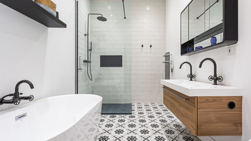 Bathroom, geometric cement tiles, oval bathtub, subway tile shower