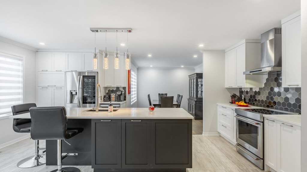 two tone modern kitchen with a big island