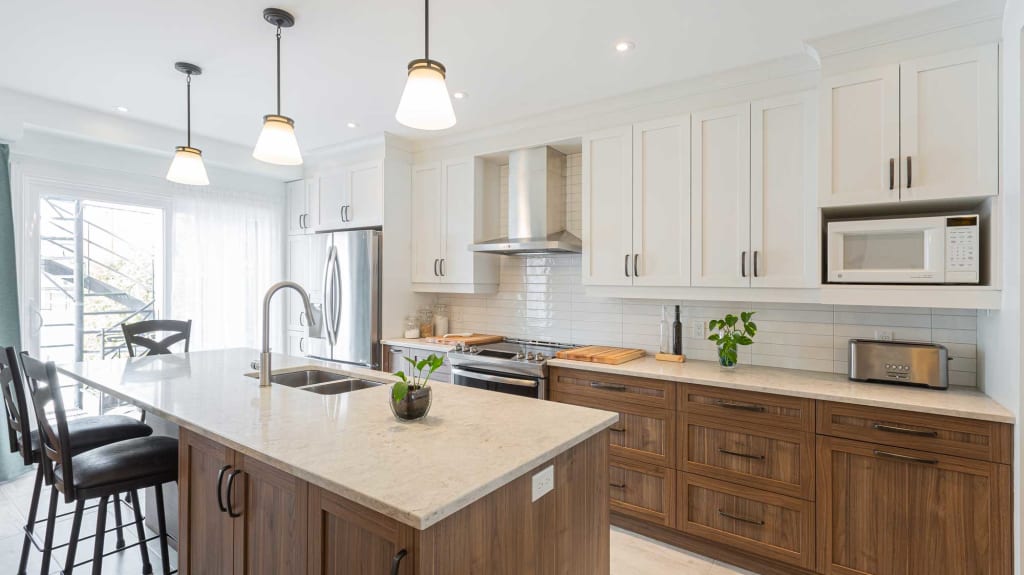 modern kitchen with white and wood custom cabinets