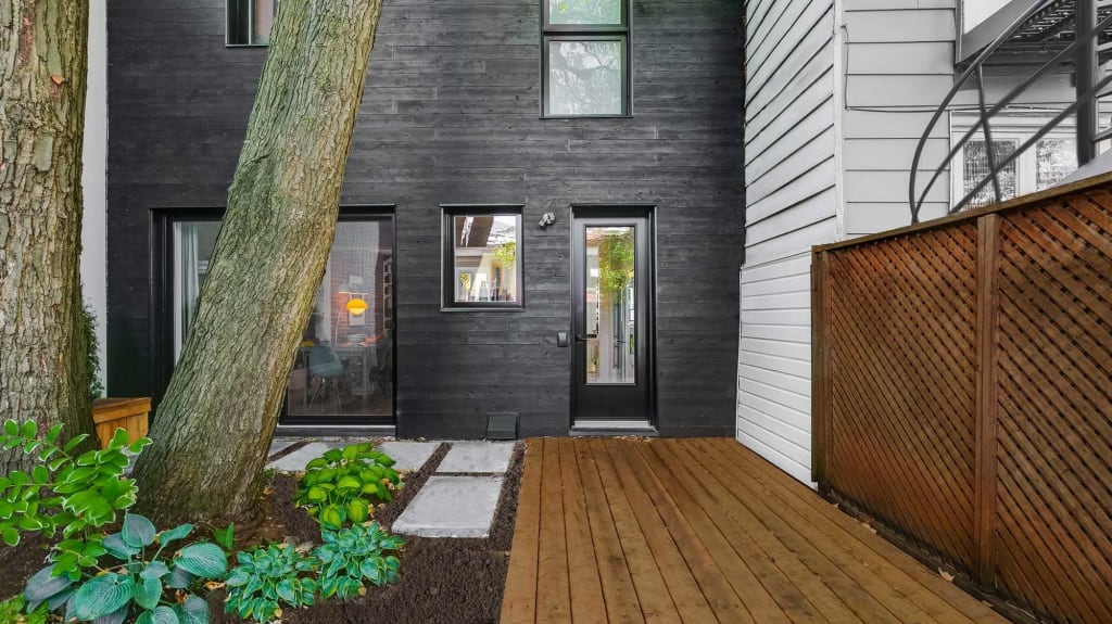 black wooden exterior siding