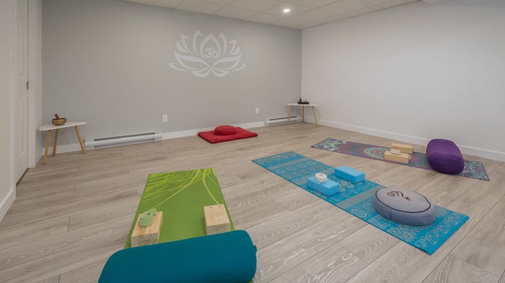 residential basement finishing with a yoga studio