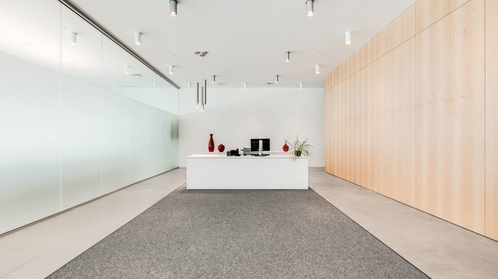 white reception desk in a newly renovated office