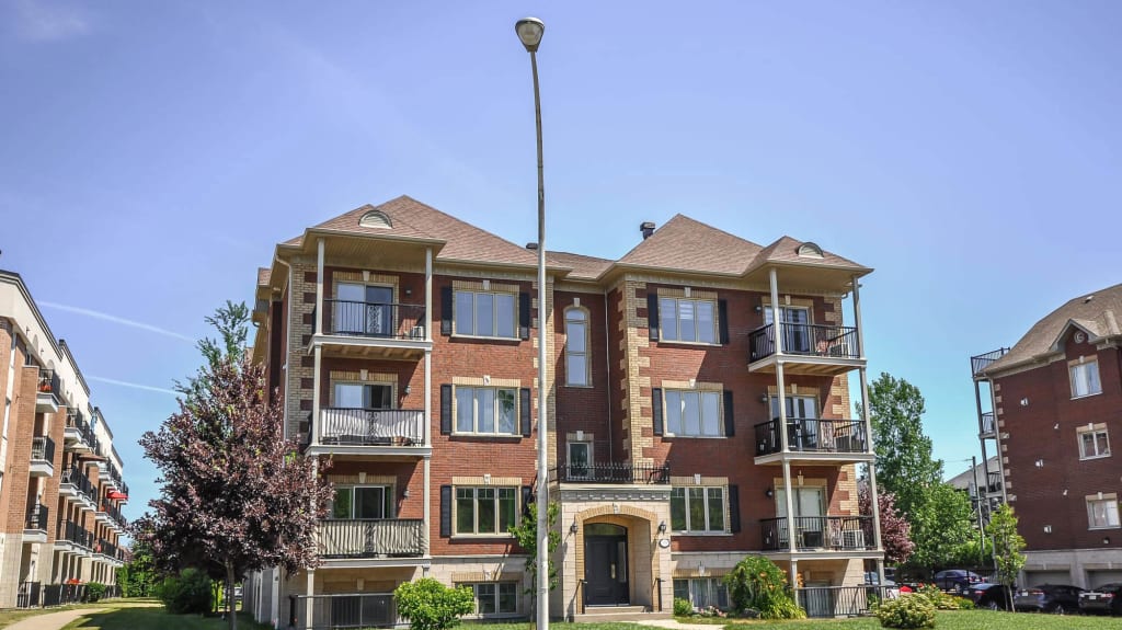 new roof (brown asphalt shingles) - condos