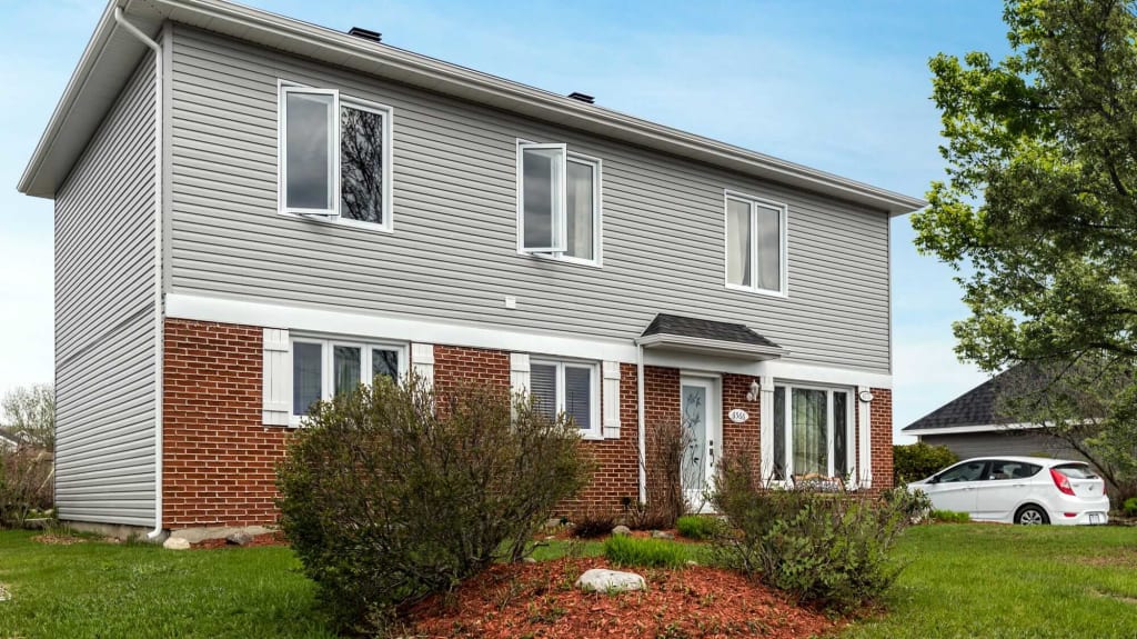 After photo of the outside of a house - Second storey addition