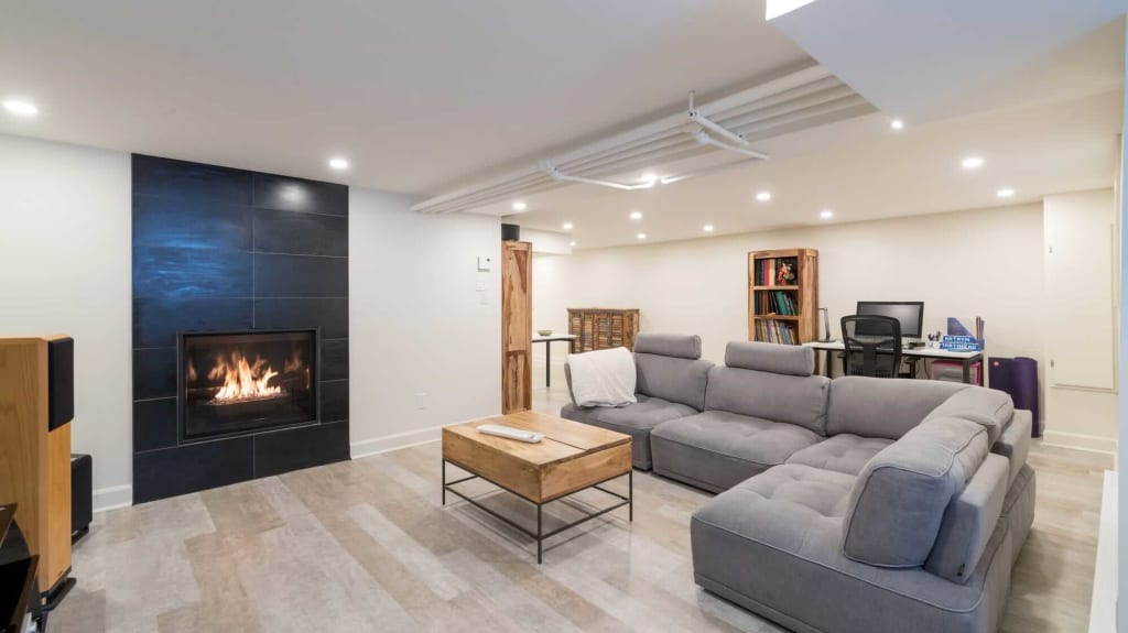 basement-family-room-with-fireplace-reno-assistance