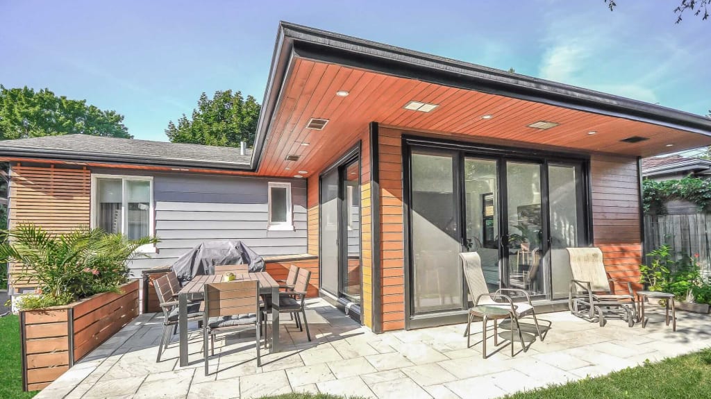 single storey extension with a concrete terrace
