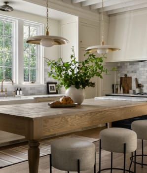 Wooden table as kitchen island