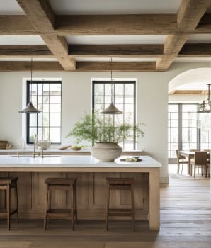 Classic farmhouse kitchen with wooden beams and large windows