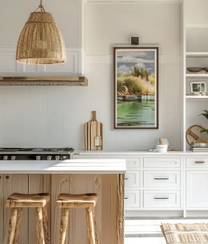 Coastal kitchen with rattan fixtures, wooden benches, plants and decorative frame