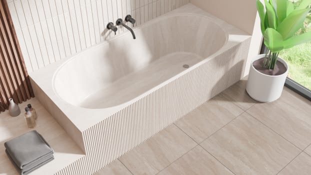 Carrelage vertical derrière une baignoire dans une salle de bain avec larges dalles au sol