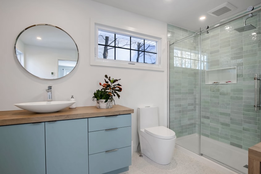 Bathroom with glass shower and modern sink