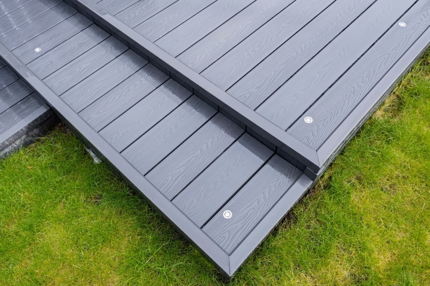 Close up view of ash gray composite deck boards