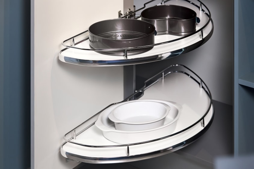 Kitchen cabinet with half-round shelves for plates storage