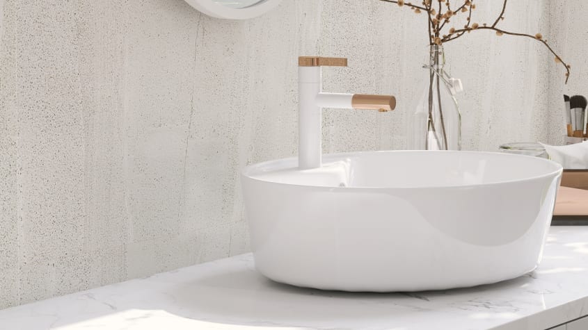Bathroom with white quarry tiles, white counter and white sink