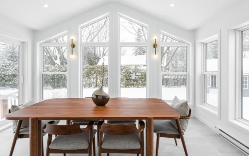 dinning room in sunroom with wood table