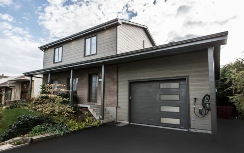 front of house with garage addition