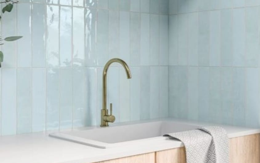 Baby blue vertical backsplash tiles