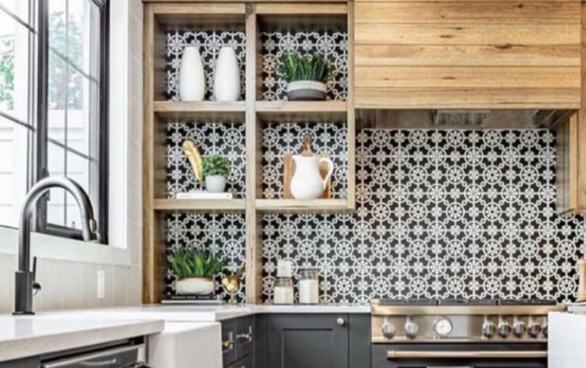 Black and white wallpaper for a kitchen with wood and grey cabinets