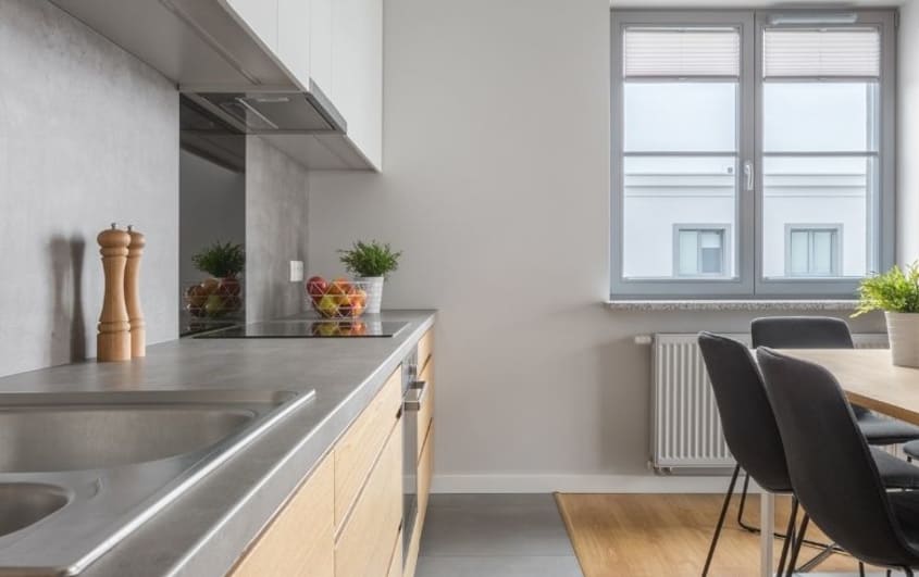 concrete countertop with a minimalistic kitchen