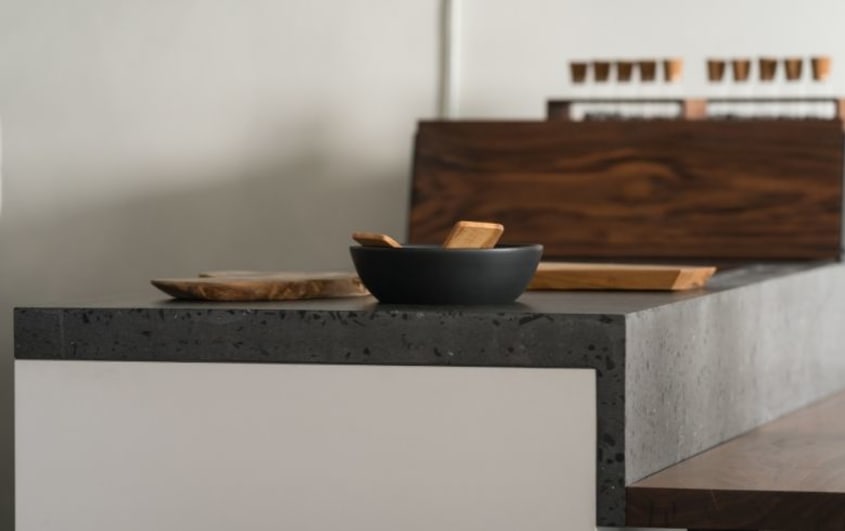 Modern minimalistic kitchen interior with concrete terrazzo countertop