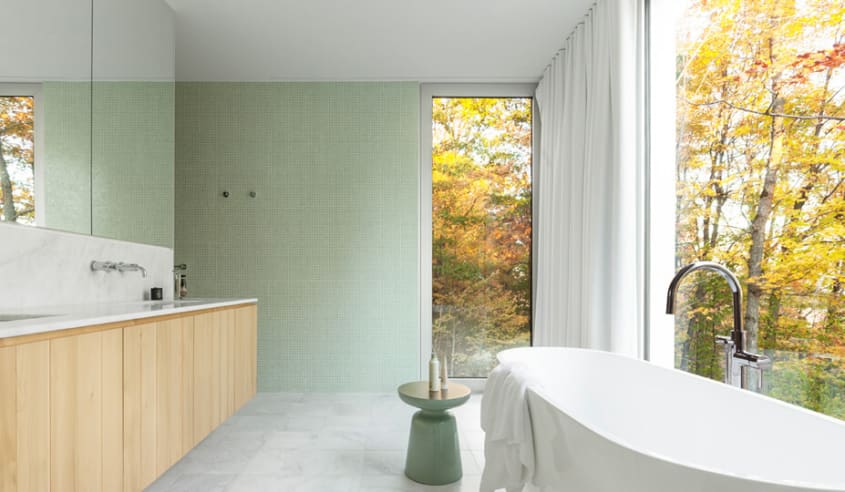 bathroom_with_floating_vanity_and_green_tiles